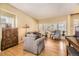Inviting living room with lots of natural light and beautiful hardwood floors at 2420 S Ellis Ct, Lakewood, CO 80228