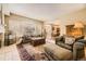 Comfortable living room with fireplace and large windows at 2420 S Ellis Ct, Lakewood, CO 80228