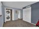 Carpeted bedroom with stackable laundry, neutral paint, and closet at 9595 Marmot Ridge Cir, Littleton, CO 80125