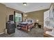 Bedroom featuring neutral walls, carpet floors, and view at 9595 Marmot Ridge Cir, Littleton, CO 80125