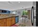 Bright eat-in kitchen area with sliding glass doors to the backyard at 9595 Marmot Ridge Cir, Littleton, CO 80125