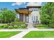 Stunning modern home with unique architectural details and well-manicured landscaping at 9244 E 37Th Ave, Denver, CO 80238