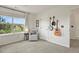 Cozy bedroom with large window and view, chair, and musical instruments on the wall at 3912 Miners Candle Pl, Castle Rock, CO 80109