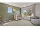 A well-lit Bedroom features large windows with views and neutral green walls at 3912 Miners Candle Pl, Castle Rock, CO 80109