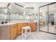 Bathroom with dual sinks and large mirror at 11065 W Rockland Dr, Littleton, CO 80127