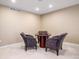 Cozy game room featuring a round table with four chairs, perfect for Gathering time at 11065 W Rockland Dr, Littleton, CO 80127