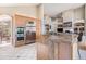 Spacious kitchen with stainless steel appliances and granite countertops, perfect for cooking and entertaining at 11065 W Rockland Dr, Littleton, CO 80127