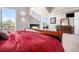 Luxurious bedroom featuring a fireplace and an exterior balcony at 11065 W Rockland Dr, Littleton, CO 80127