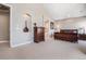 Tranquil bedroom with an arched entryway to the ensuite and a calming decor at 11065 W Rockland Dr, Littleton, CO 80127