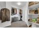 Spacious walk-in closet with carpet and storage shelves for an organized living space in a new home at 16680 Stroilway St, Hudson, CO 80642