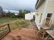 A big backyard includes a wood deck, shed, grass, and a chair, ready for outdoor enjoyment at 19939 Mitchell Cir, Denver, CO 80249