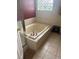 Bathroom featuring a soaking tub with chrome fixtures at 19939 Mitchell Cir, Denver, CO 80249