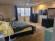 Spacious bedroom featuring a ceiling fan, window, and dark dresser set at 19939 Mitchell Cir, Denver, CO 80249