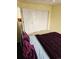 Bedroom featuring a sliding door closet and dark furniture at 19939 Mitchell Cir, Denver, CO 80249