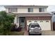 Charming two-story home featuring an attached two-car garage and well-maintained landscaping at 19939 Mitchell Cir, Denver, CO 80249