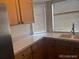 Modern kitchen with updated countertops, ample cabinet space, and modern appliances at 19939 Mitchell Cir, Denver, CO 80249