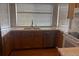 Bright kitchen featuring updated countertops, and stainless steel appliances at 19939 Mitchell Cir, Denver, CO 80249