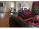 Inviting living room showcasing hardwood floors and modern furnishings, perfect for relaxation and entertaining at 19939 Mitchell Cir, Denver, CO 80249