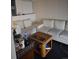 View of a seating area with couches and a wooden table at 19939 Mitchell Cir, Denver, CO 80249
