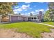Charming brick home featuring a well-manicured lawn and a unique architectural style at 1830 Zang St, Golden, CO 80401