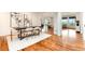 Open dining room features hardwood floors and flows into the living spaces, perfect for entertaining at 10783 Skydance Dr, Highlands Ranch, CO 80126