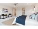 Well-lit primary bedroom featuring stylish decor and comfortable seating area at 10783 Skydance Dr, Highlands Ranch, CO 80126