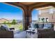 Relax on the outdoor deck with comfortable seating and panoramic mountain vistas at 10783 Skydance Dr, Highlands Ranch, CO 80126