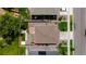 An aerial view of a home, showcasing a well kept roof and fenced backyard at 502 Ledge St, Brighton, CO 80603