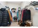 Large walk-in closet with shelving and hanging rods at 7440 S Blackhawk St # 9-204, Englewood, CO 80112