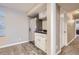 Functional wet bar area with stainless steel refrigerator and cabinets for convenient entertaining in the basement at 7157 S Niagara Ct, Centennial, CO 80112