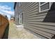 Home exterior showing a sliding door to the backyard at 28330 E 6Th Pl, Watkins, CO 80137