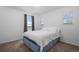 Bedroom features natural light from two windows creating a warm and inviting atmosphere at 28330 E 6Th Pl, Watkins, CO 80137
