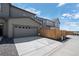 Attached two-car garage offering ample parking space and convenient home access at 28330 E 6Th Pl, Watkins, CO 80137