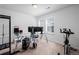 Office space with carpet flooring, large glass desk, and ample natural light at 28330 E 6Th Pl, Watkins, CO 80137