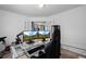 Cozy office featuring a large desk and bright overhead lighting at 28330 E 6Th Pl, Watkins, CO 80137