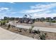 Community playground featuring slides, climbing structures, and a walking path at 28330 E 6Th Pl, Watkins, CO 80137
