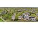 Aerial view of neighborhood showcasing the landscape, mature trees, and well-kept lawns at 3418 Elk Ct, Broomfield, CO 80020