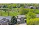 Beautiful neighborhood with a view of the community park with walking paths and a pond at 3418 Elk Ct, Broomfield, CO 80020