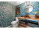 Stylish powder room with floral wallpaper and custom vanity at 3418 Elk Ct, Broomfield, CO 80020