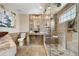 Luxurious bathroom featuring a glass-enclosed shower and modern fixtures at 3418 Elk Ct, Broomfield, CO 80020