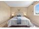 A well appointed bedroom is decorated with a cow skull above the bed at 3418 Elk Ct, Broomfield, CO 80020