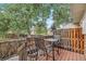 Inviting deck with outdoor seating, perfect for relaxing and enjoying the beautiful surroundings and outdoor dining at 9519 W Coal Mine Ave # F, Littleton, CO 80123