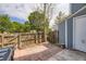 Cozy backyard featuring a brick patio, wood fence, and access to a small storage shed at 4130 E 94Th Ave # B, Thornton, CO 80229