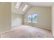 Bright bedroom featuring vaulted ceilings, carpet floors, and many windows at 4130 E 94Th Ave # B, Thornton, CO 80229