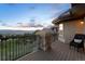 Balcony with great views, iron railings and a chair overlooking the neighborhood at 4605 Tierra Alta Dr, Castle Rock, CO 80104