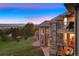 Stone house featuring a balcony with great views and an outdoor patio at 4605 Tierra Alta Dr, Castle Rock, CO 80104