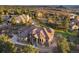 Expansive home showcasing a detailed tile roof, complemented by lush trees and a picturesque view at 4605 Tierra Alta Dr, Castle Rock, CO 80104