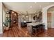 Spacious kitchen with center island, breakfast bar, fireplace and modern appliances at 4605 Tierra Alta Dr, Castle Rock, CO 80104