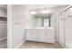 Bathroom with double sinks, and walk-in shower at 2248 Rosette Ln, Castle Rock, CO 80104
