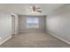 Large bedroom with plush carpet and neutral paint at 2248 Rosette Ln, Castle Rock, CO 80104